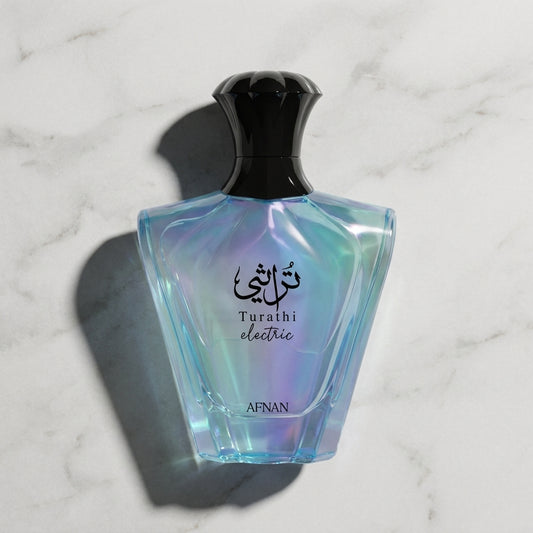 Afnan Turathi Electric EDP bottle on marble